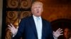 FILE - President-elect Donald Trump speaks to reporters at Mar-a-Lago in Palm Beach, Florida. 