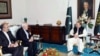In this handout photograph released by the Press Information Department (PID) on May 3, 2017, Pakistan's Prime Minister Nawaz Sharif (R) meets with Iranian Minister of Foreign affairs Mohammad Javad Zarif (2L) at the Prime Minister's House in Islamabad. 