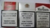 Des paquets de cigarette togolais, le 27 juin 2014. (VOA/Kayi Lawson)