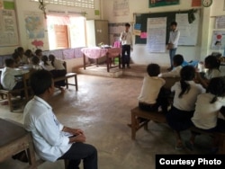 Thorn Bun Thoeng and his students are conducting an outreach program to raise awareness of sanitation and environmental protection at one of the local elementary schools in Preah Dak village, Siem Reap. (Courtesy Photo)
