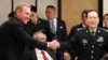 Acting U.S. Secretary of Defense Patrick Shanahan, left, shakes hands with Chinese Minister of National Defense Gen. Wei Fenghe on the sidelines of the 18th International Institute for Strategic Studies Shangri-la Dialogue, Singapore, June 1, 2019. 
