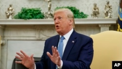 Le président Donald Trump dans le bureau ovale de la Maison-Blanche, à Washington, le 22 juillet 2019.