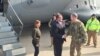 FILE - Army Lt. Gen. Sean MacFarland greets U.S. Defense Secretary Ash Carter after arriving in Baghdad, Dec. 16, 2015. MacFarland says end of IS is ‘a matter of time’ and more help."