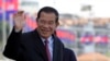Cambodia's Prime Minister Hun Sen greets his government officials as he arrives to watch the boat races at the Royal Palace during the annual water festival in Phnom Penh, Cambodia, Thursday, Nov. 2, 2017. The 3-day traditional water festival is dedicated