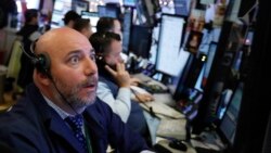 VOA Asia – Financial markets react to U.S.-China trade developments and Huawei arrest