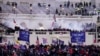 FILE - Violent rioters loyal to President Donald Trump storm the Capitol in Washington on Jan. 6, 2021. 