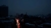 FILE PHOTO: A view shows the city without electricity after critical civil infrastructure was hit by Russian missile attacks in Kyiv