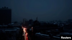 FILE PHOTO: A view shows the city without electricity after critical civil infrastructure was hit by Russian missile attacks in Kyiv