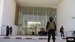FILE - Guards secure the Bardo Museum in Tunis, hours after gunmen stormed it in March 2015. U.S. defense and intelligence officials pinned responsibility for the attack on the Islamic State group but later came to believe that a terror facilitator from al-Qaida in the Islamic Maghreb had played some role. (M. Krit/VOA)