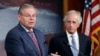 U.S. Senate Foreign Relations Committee Chairman Robert Menendez (L) and ranking member Senator Bob Corker are seen holding a news conference on Capitol Hill in Washington, D.C.