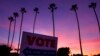 FILE - A sign directs the way to a polling place at Marina Park Community Center in Newport Beach, California, Nov. 5, 2024.