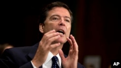 FBI Director nominee James Comey testifies before the Senate Judiciary Committee hearing about his nomination, on Capitol Hill in Washington, July 9, 2013.
