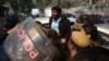 Indian student union leader Kanhaiya Kumar (C) is escorted by police into Patiala Court for a hearing in New Delhi on Feb. 17, 2016.