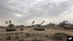 Tanks irakiens à Al-Bashir, sud de Kirkouk, Irak, le 13 octobre 2017. 
