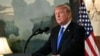 FILE - President Donald Trump speaks at the White House in Washington, Oct. 13, 2017. 
