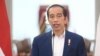 Presiden Jokowi menyampaikan sambutan dalam acara Investor Daily Summit di Jakarta, Selasa (13/7). (VOA)