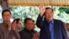 Cambodia's Prime Minister Hun Sen waves on his arrival for a groundbreaking ceremony for a bridge over the Tonle Sap river, at Russey Keo village near Phnom Penh, Cambodia, Monday, Oct. 23, 2017. (AP Photo/Heng Sinith)