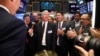 FILE - Liberty Oilfield Services Inc. CEO Chris Wright, center, rings a ceremonial bell to celebrate the companies IPO on the floor of the New York Stock Exchange, Jan. 12, 2018. President-elect Donald Trump has selected, Nov. 16, 2024, Wright to lead the Energy Department.