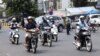 People are driving on the street in Phnom Penh city, Cambodia on February, 11, 2020.(Malis Tum/VOA Khmer)