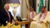 U.S. Secretary of State Rex Tillerson and Saudi King Salman speak before their meeting in Riyadh, Saudi Arabia, Oct. 22, 2017.