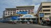 A general view shows the Orussey Market after it was temporarily closed following a few vendors testing positive for the Covid-19 coronavirus, in Phnom Penh, Cambodia, on April 4, 2021. (Photo by TANG CHHIN Sothy / AFP)