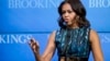 Michelle Obama speaks about "mobilizing for children's rights, supporting local leaders and improving girls' education", Dec. 12, 2014, at the Brookings Institution in Washington. 