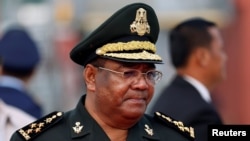 File: Hing Bun Hieng, the commander of Cambodian Prime Minister Hun Sen's bodyguard unit, stands at the International Airport of Phnom Penh as he accompanies Prime Minister Hun Sen to Singapore for the 32nd ASEAN Summit, in Phnom Penh, Cambodia, April 27, 2018.