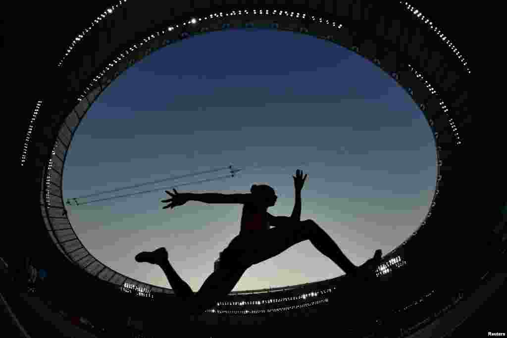 An athlete competes in the Women's Triple Jump Qualification at the 2019 IAAF Athletics World Championships at the Khalifa International Stadium in Doha, Qatar.