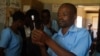A medical worker at Likuni Community Hospital, in Lilongwe, Malawai draws the malaria vaccine into a syringe for vaccination.