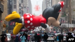 The Minnie Mouse balloon floats during the annual Macy's Thanksgiving Day Parade in New York on Nov. 28, 2024.
