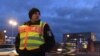 A policeman secures a street close to the Chancellery, the host of the Libya summit in Berlin, Germany, Jan. 18, 2020.