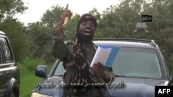 Une photo de l'individu se présentant comme Abubakar Shekau, chef de la milice islamiste Boko Haram (AFP)