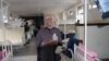 FILE - Albino Said Abdallah, who lost his left hand in an attack, is seen recovering at Morogoro hospital, Tanzania, May 7, 2010.