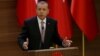 FILE - Turkish President Recep Tayyip Erdogan makes a speech at the Presidential Palace in Ankara, Nov. 26, 2015. Ankara summoned the American ambassador, John Bass, on Feb. 9, 2016, to protest remarks by a State Department spokesman who said Washington does not consider Syria's Kurdish Democracy Union Party (PYD) a terrorist organization.