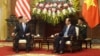 U.S. Defense Secretary Jim Mattis chats with Vietnamese President Tran Dai Quang at the presidential palace in Hanoi, Vietnam, Jan. 25, 2018.