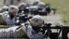 FILE - Coalition forces train at NATO centers in Afghanistan. Islamic State fighters are losing their hold in the country, a United States military spokesman said Thursday.