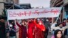 សកម្មជន​ និង​ព្រះសង្ឃ​ចូលរួមធ្វើ​បាតុកម្ម​តវ៉ា​ប្រឆាំង​នឹង​រដ្ឋាភិបាល​យោធា នៅទីក្រុង​ Mandalay ប្រទេស​មីយ៉ាន់ម៉ា ថ្ងៃទី១ ខែកុម្ភៈ​ ឆ្នាំ២០២២។ 