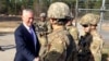 FILE - Defense Secretary Jim Mattis greets soliders at Fort Bragg, N.C, Dec. 22, 2017. 