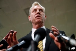 Acting Defense Secretary Patrick Shanahan speaks to reporters after a classified briefing for members of Congress on Iran, May 21, 2019, on Capitol Hill in Washington.