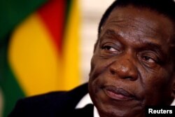 FILE - Zimbabwean President Emmerson Mnangagwa is pictured at a news conference at the State House in Harare, Zimbabwe, Aug. 3, 2018.