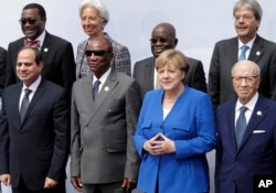 Front from left, the president of Egypt, Abdel Fattah el-Sissi, chairman of the African Union and President of Guinea Alpha Conde, German Chancellor Angela Merkel and the President of Tunisia during the conference 'G20 Africa Partnership – Investing in a Common Future' in Berlin, June 12, 2017.