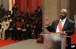 FILE - Gabon's President Ali Bongo Ondimba, as he is sworn in for a second term in Libreville, Gabon, Sept. 27, 2016.