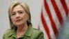Democratic presidential candidate Hillary Clinton speaks to media as she meets with law enforcement leaders at John Jay College of Criminal Justice in New York, Aug. 18, 2016.