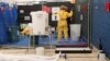 MSF volunteer receives training on how to handle personal protective equipment during Ebola response courses, Brussels, Oct., 15, 2014.