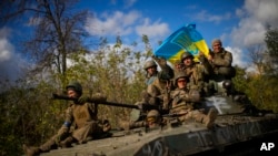 Українські військові під час звільнення Харківщини восени 2022 року.