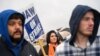 Union members in Spring Hill, Tennessee picket General Motors on Oct. 30, 2023. The company and the union reached a tentative deal Monday, ending the six-week campaign of coordinated strikes. 