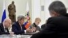 U.S. Secretary of State John Kerry (2nd L) speaks during a meeting with Russian President Vladimir Putin (not pictured) at the Kremlin in Moscow, March 24, 2016.