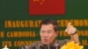 FILE: Cambodia's Prime Minister Hun Sen gestures during a speech at an inauguration ceremony for the official use of a friendship bridge between Cambodia and China at Takhmau, Kandal provincial town south of Phnom Penh, Cambodia, Monday, Aug. 3, 2015.