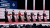 Democratic presidential candidates from left, entrepreneur Andrew Yang, Pete Buttigieg, Sen. Elizabeth Warren, former VP Joe Biden, Sen. Bernie Sanders, Sen. Amy Klobuchar, and businessman Tom Steyer in Los Angeles, Dec. 19, 2019.