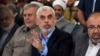 FILE - Yahya Sinwar, the leader of Hamas in Gaza, greets supporters at a meeting in Gaza City on April 30, 2022. The EU added Sinwar to its terrorist sanctions blacklist on Jan. 16, 2024.